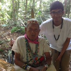 A UAH student meets with a village elder in Ecuador